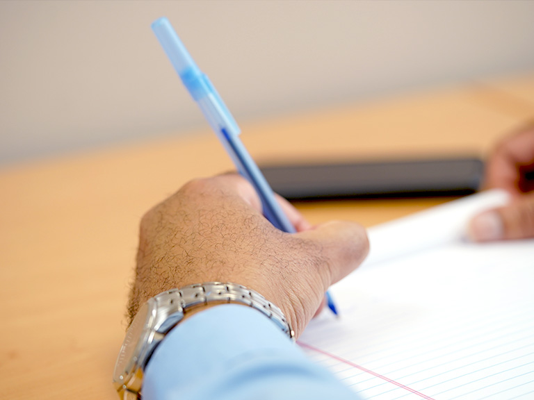 Lawyer writing legal documents Lawyer writing legal documents